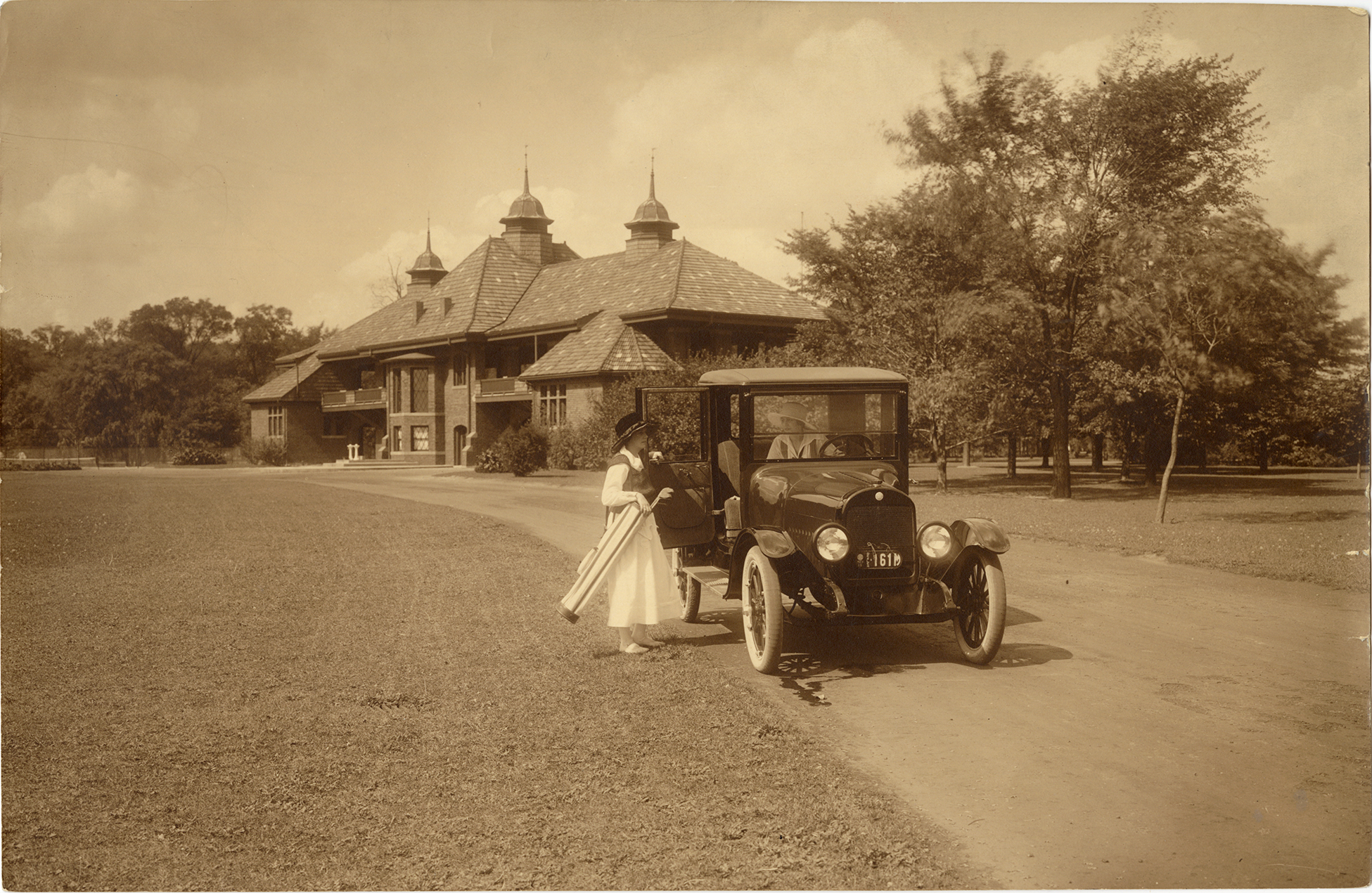 Women posing with Dort automobile, Belle Isle