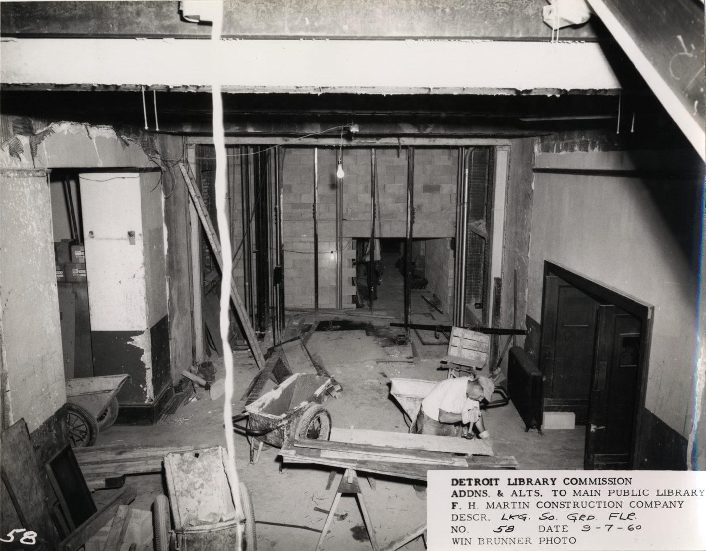 Construction worker on ground floor, Main Library | DPL DAMS