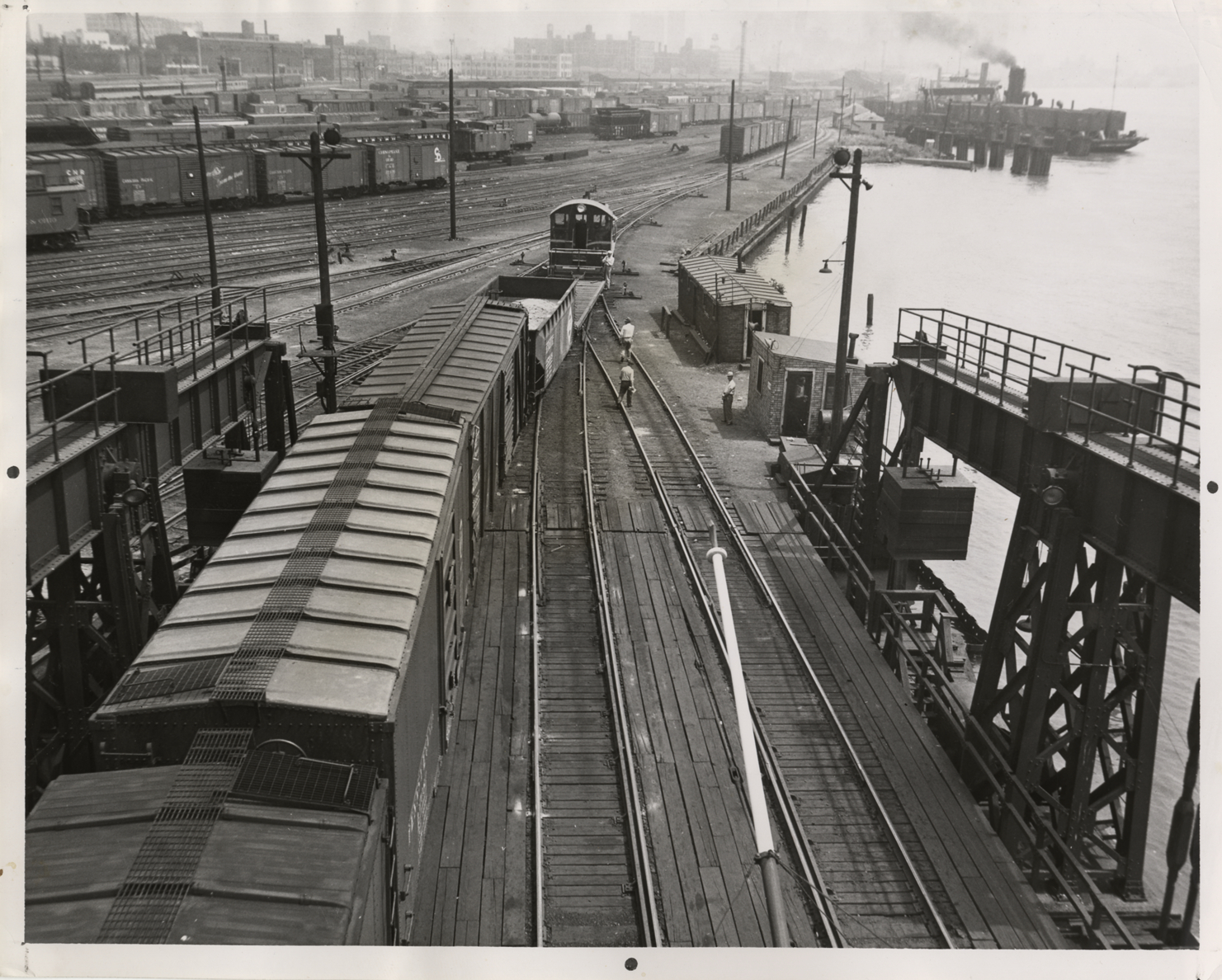 Railroad cars being loaded onto ferry | DPL DAMS